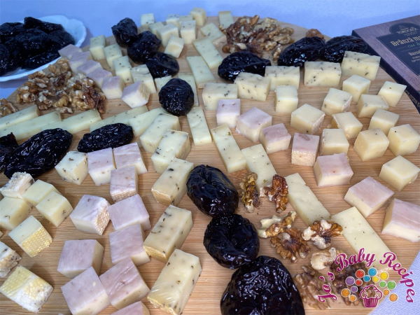 Platter with cheese and prunes